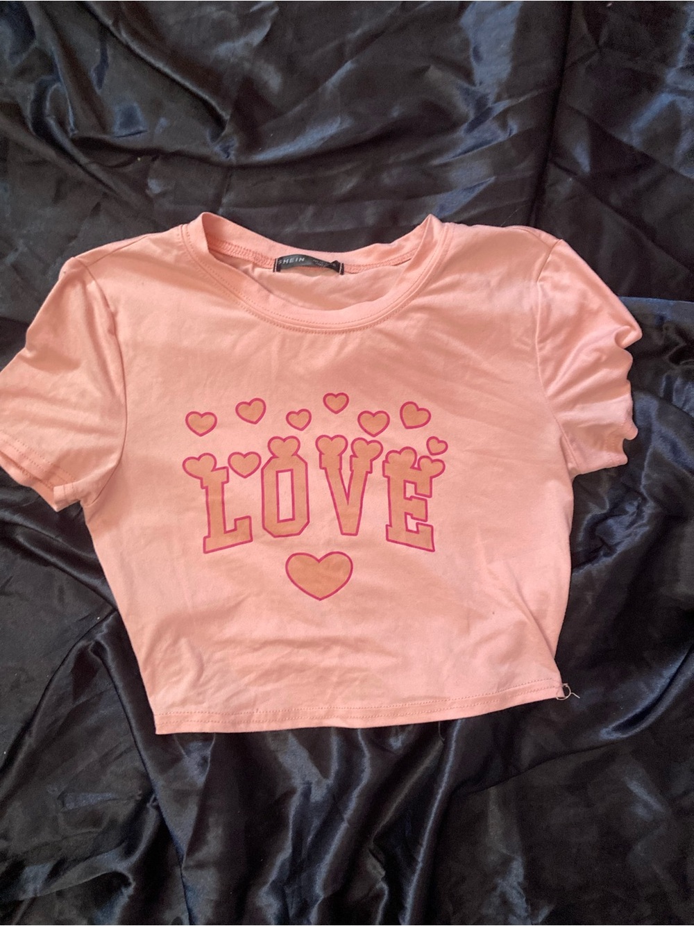 Soft pink graphic crop top